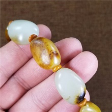 琪玉商城和田玉细腻饱满好型黄沁白玉皮色籽料手链56.8克